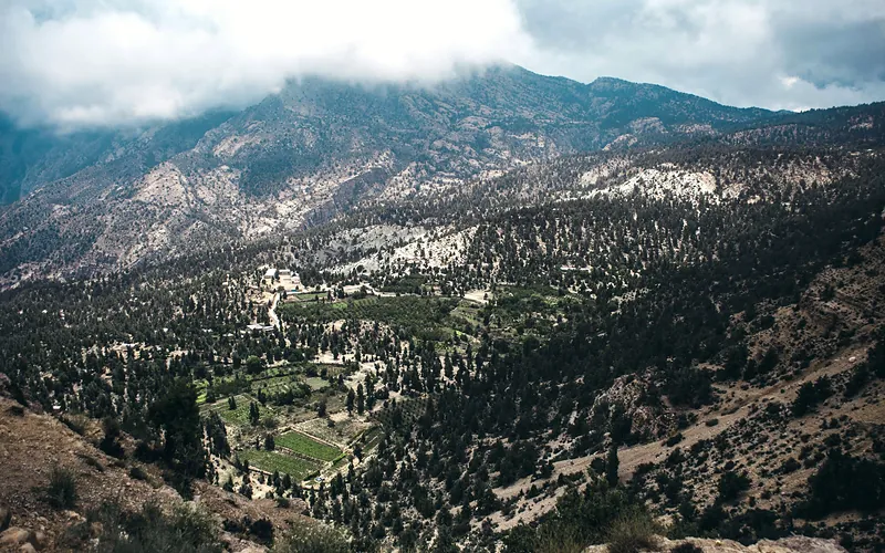 Breathtaking aerial view of Ziarat Valley in Balochistan, showcasing mountainous terrain and lush greenery, Balochistan