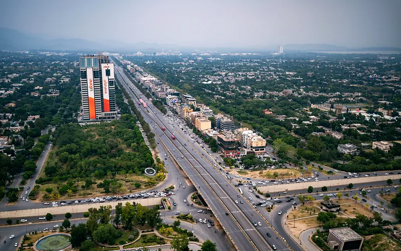 An aerial view of Islamabad Expressway showcasing the city's urban landscape and modern architecture