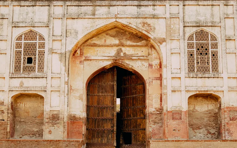 A classic arched doorway with intricate designs in Sheikhupura, Pakistan