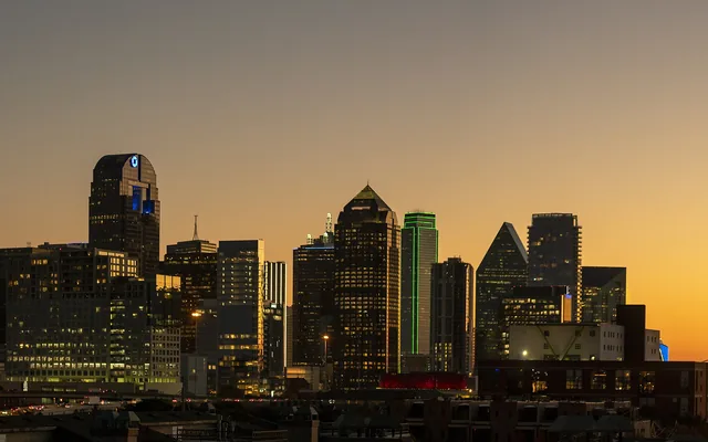 The Dallas skyline in Texas lit up at dusk